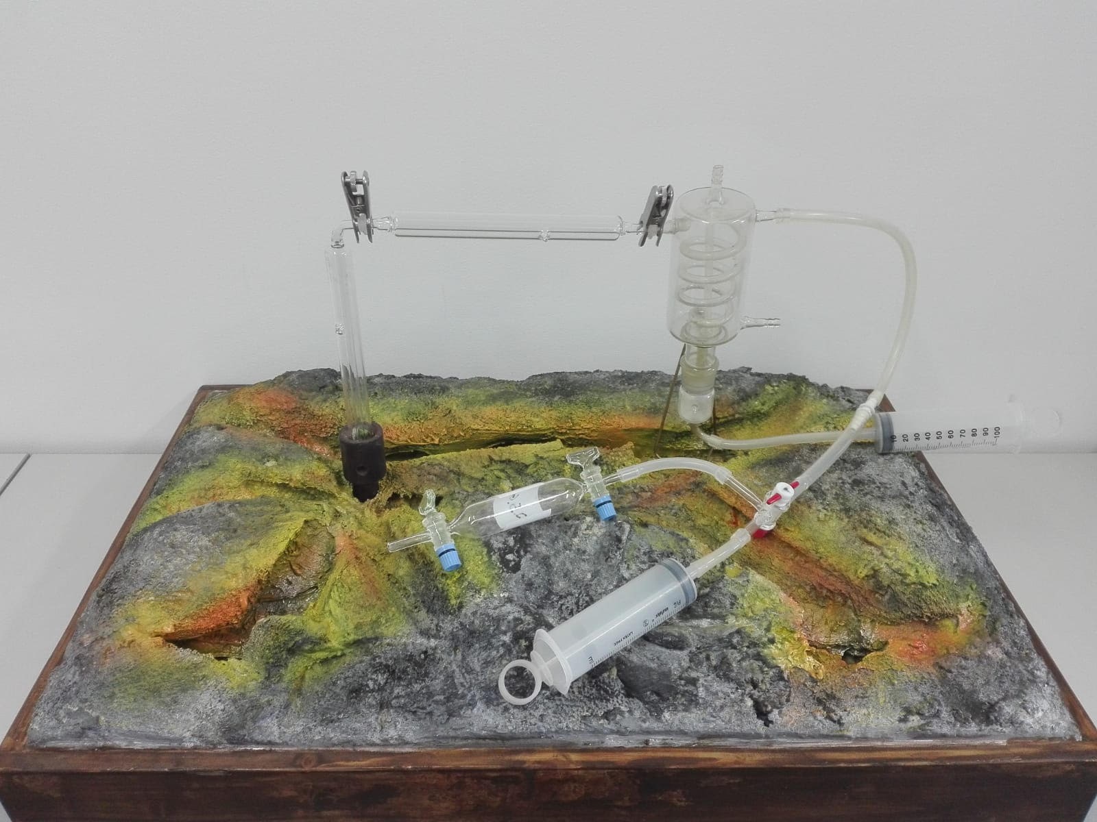 Diorama of a gas fumarole with sampling system